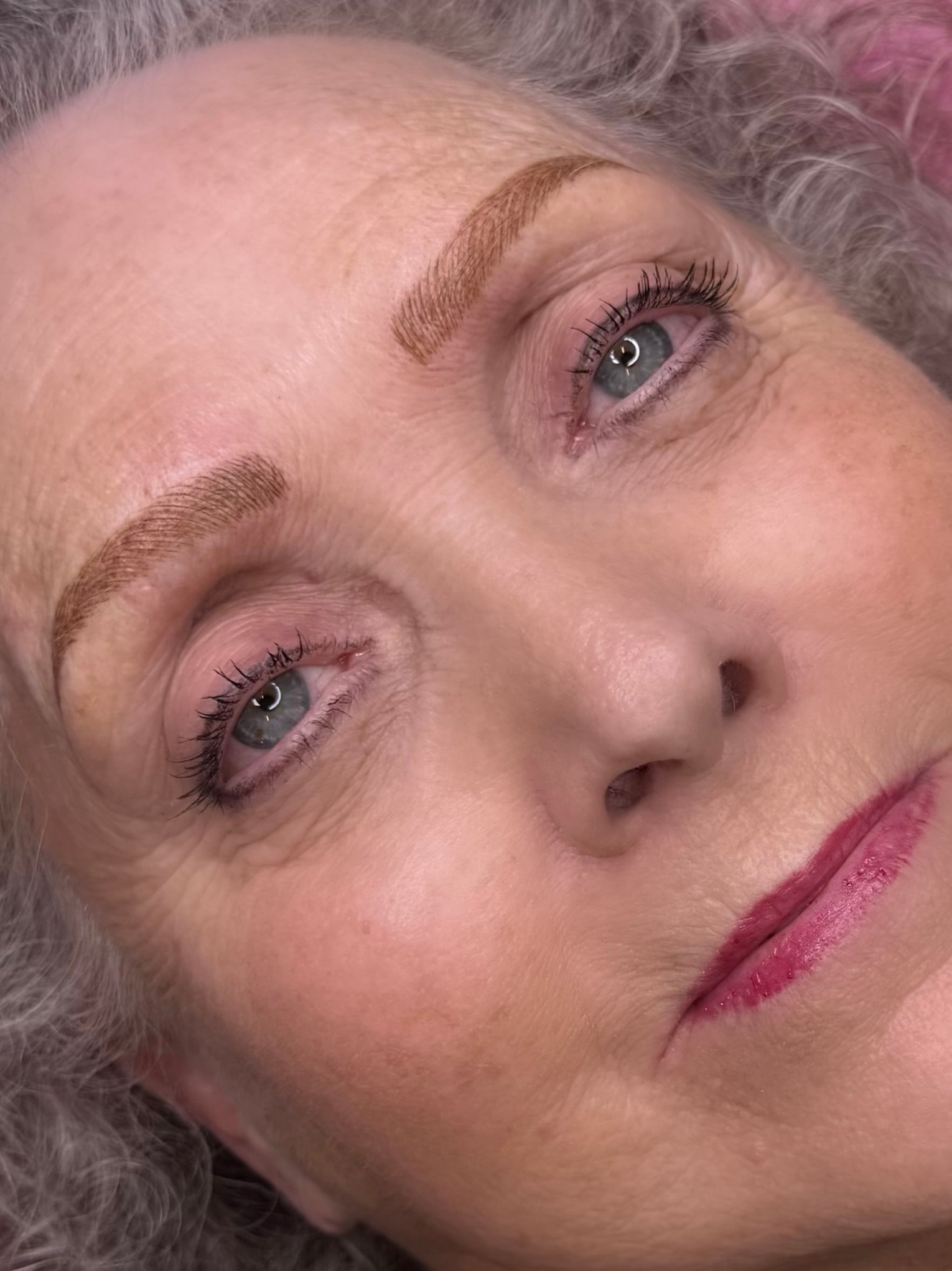 Fresh brow result on curly silver haired client