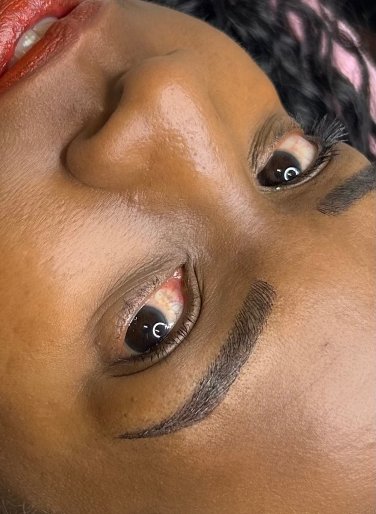 Nano brows on melanin rich skin close up